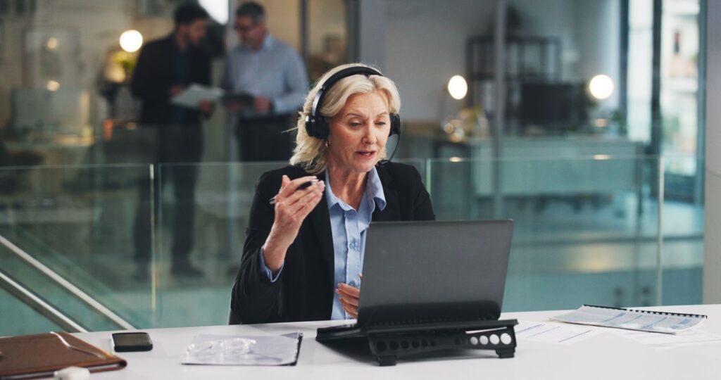 Legal intake service for personal injury firms: intake specialist with a headset taking a call